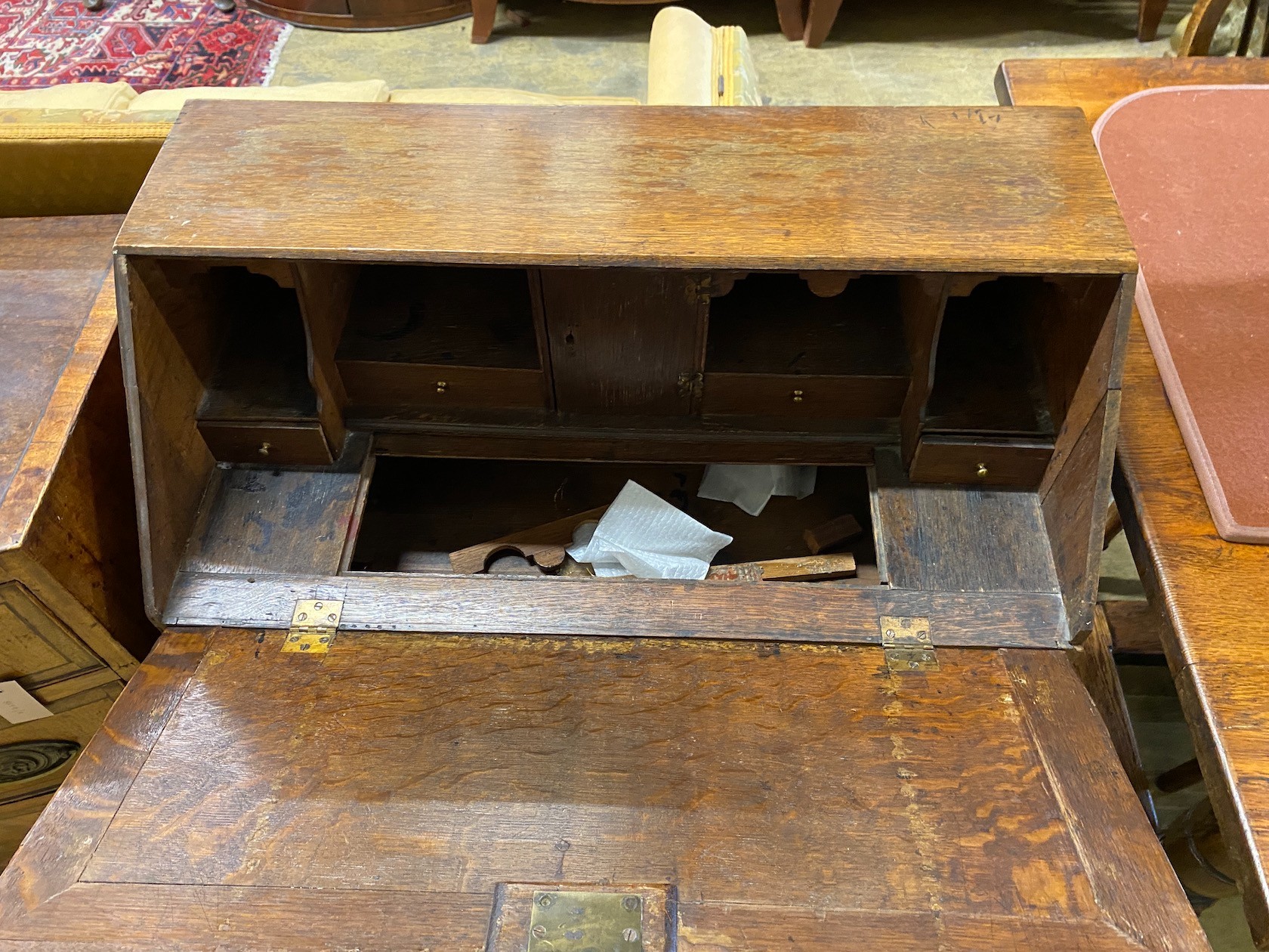 A small 18th century oak bureau, width 76cm, depth 40cm, height 94cm